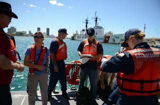 Crewmembers from the Coast Guard National Strike Force head to their first location to use a water quality instrument used to monitor depleted oxygen and pH levels in Honolulu Harbor, Honolulu Sept. 15, 2013. Personnel from the Coast Guard, U.S. Environmental Protection Agency, U.S. Fish and Wildlife, National Oceanic and Atmospheric Administration and Lockheed Martin tested the water at various locations around Honolulu Harbor affected by the molasses spill. U.S. Coast Guard photo by Petty Officer 3rd Class Tara Molle