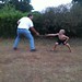 Daddy and son "sword" fighting