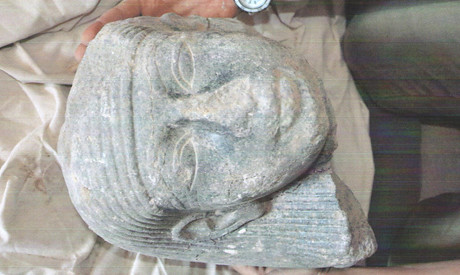 New Kingdom granite head uncovered in Luxor, Egypt. The military regime says its will heighten security near antiquity sites. by Pan-African News Wire File Photos