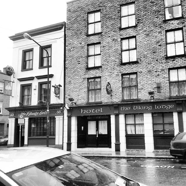 A bit of Francis St. In Dublin. The Liberty Belle pub next to the Viking Lodge and hotel. I am not sure but I think Vikings were not likely to support liberty or bells for that matter... oh and it is still raining. #dublin #ireland #architecture #humor #w
