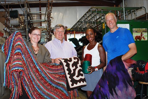 Business Program Specialist Deborah Rausch, Ohio Rural Development State Director Tony Logan, Toia Rivera-Strohm and Brad Strohm show off local textiles from the VonStrohm Woolen Mill & Fiber Arts Studio in Pickaway County. The small business was awarded VAPGs in 2010 and 2012. (USDA photo)