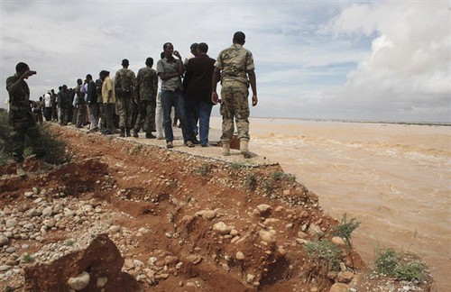Somalian semi-autonomous region of Puntland officials view a bridge that was destroyed in a tropical cyclone on November 13, 2013. The bridge was located between Garowe and Eyl. by Pan-African News Wire File Photos