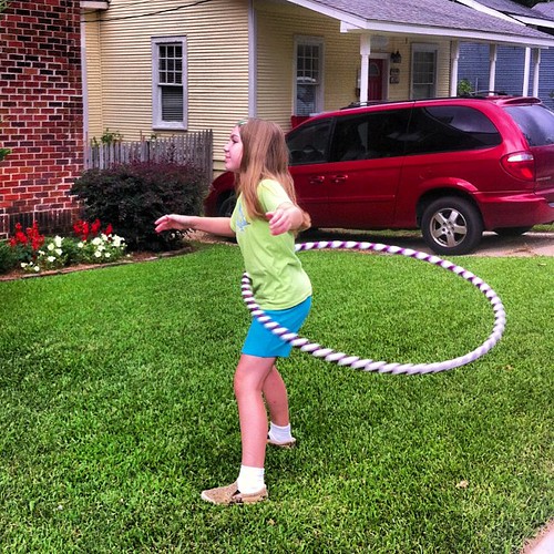 Laura practices her hula hooping skills.