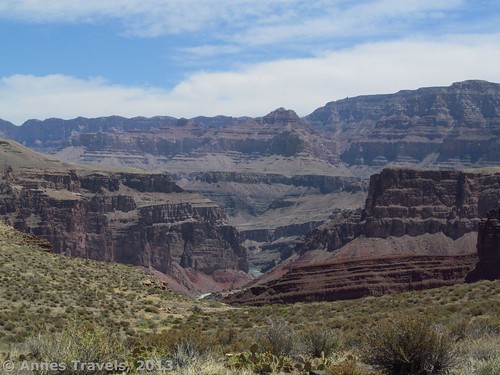 The Colorado River appears just before the Tonto Trail turns to skirt Dark Canyon, Grand Canyon National Park, Arizona