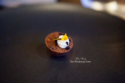 Amuse bouche of olive and cheese financier