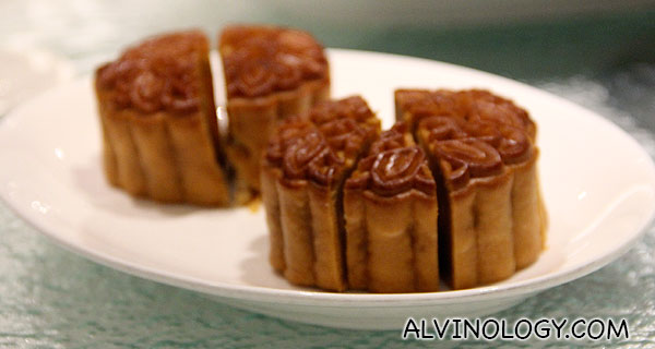 Share mooncakes with the community for bonding :)