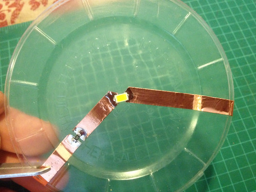 LED soldering onto copper tape on plastic container lid