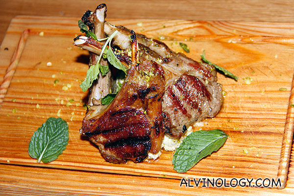 Lamp Chop Lollipops (Bone-in grilled lamb chops served with a creamy artichoke & mint sauce, roasted nuts, chilli & fresh mint) - S$29.90