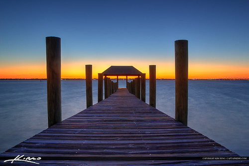 Dock on Lake at Sunset Hutchinson Island Florida by Captain Kimo