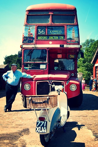 A red London Bus and a 1960s Scooter by davekpcv