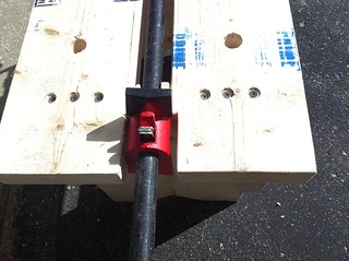 Pipe clamp and bench dog holes