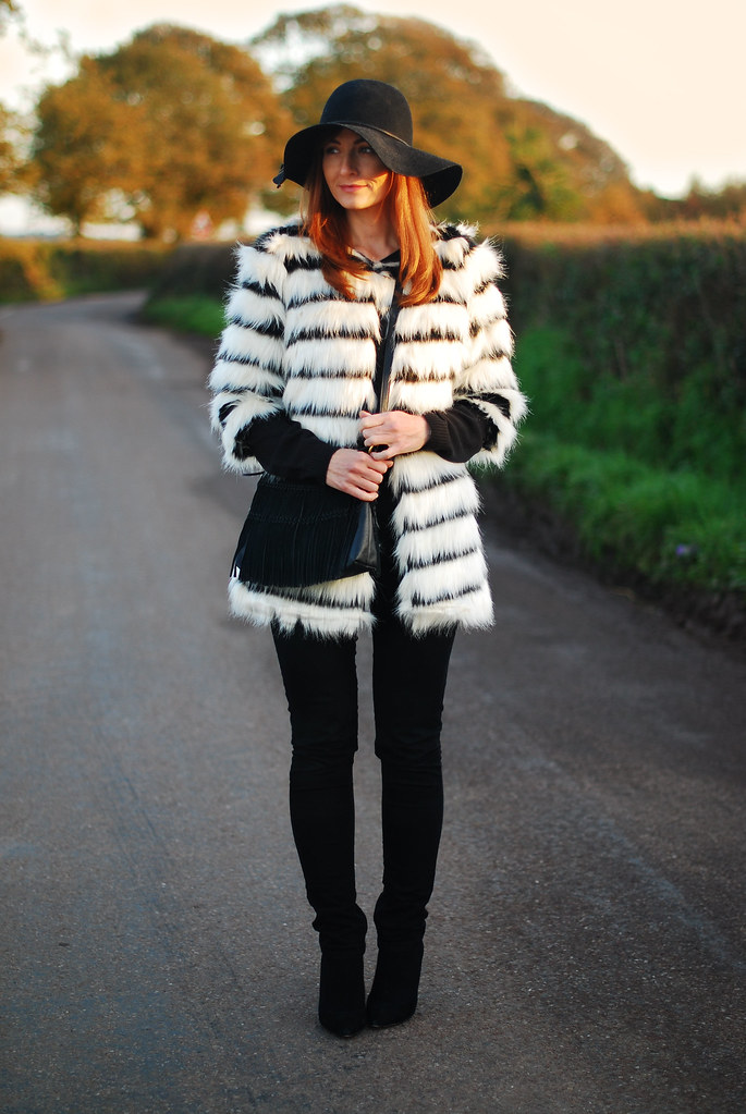 Black & white striped fur coat, black skinnies