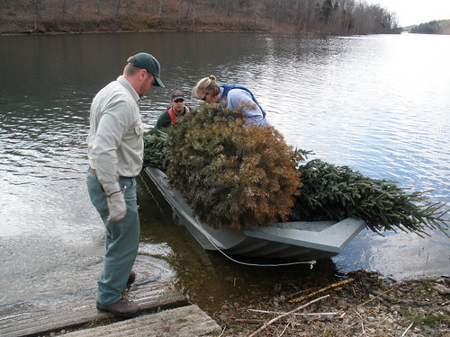 Tell City Ranger District employees prepare to install recycled fish habitat in an Indiana lake. (U.S. Forest Service)
