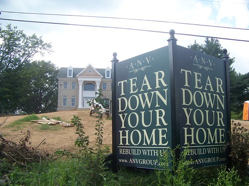 A sign promoting tear downs and McMansions in Great Falls, Virginia