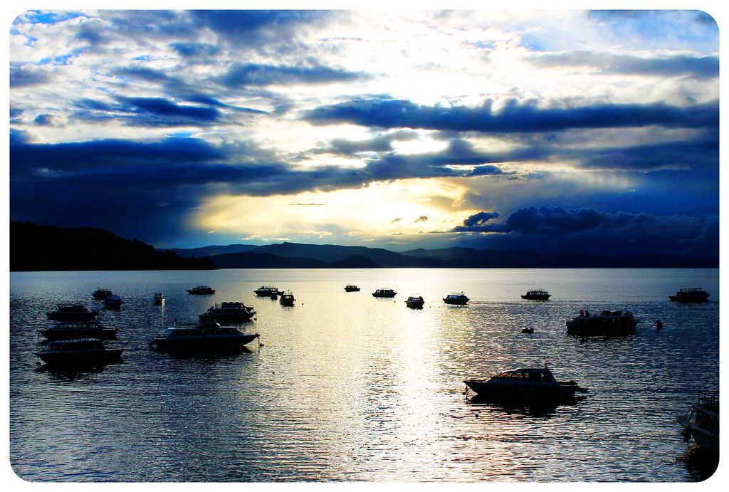 lake titicaca with boats copacabana bolivia