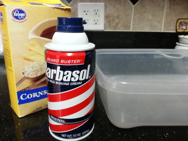 The ingredients are pretty simple: corn starch, shaving cream and a container to mix them in.