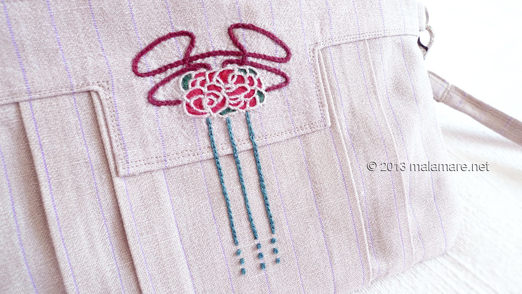 Art Deco inspired linen clutch bag with hand embroidery