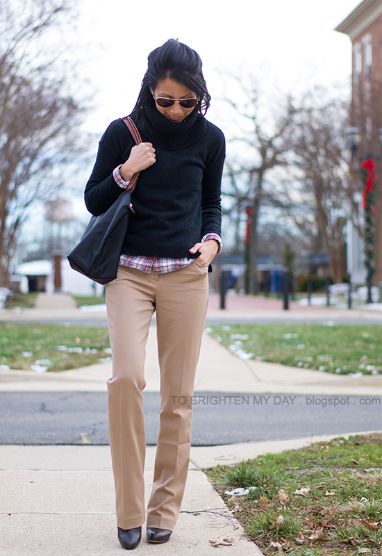 black cowlneck sweater, tartan shirt, camel trousers
