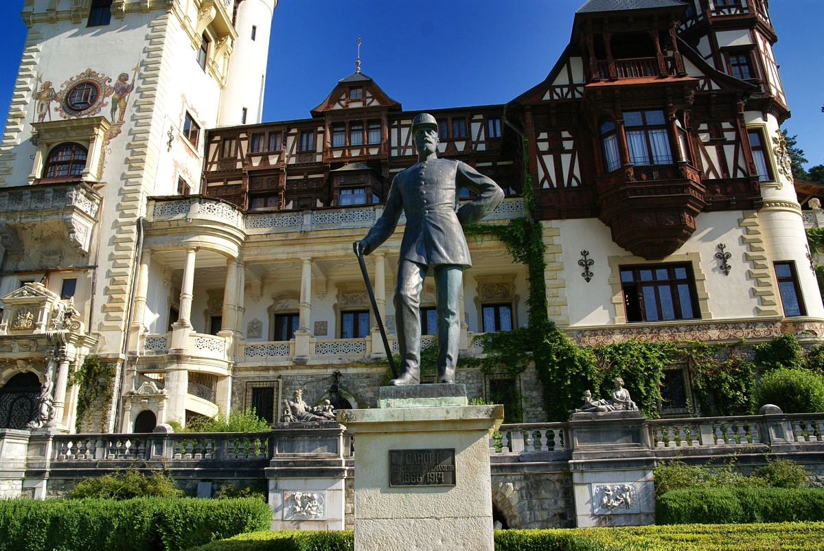 A statue of King Carol I by Raffaello Romanelli overlooks the main entrance of Peleş Castle. Credit Gaspar Ros