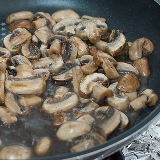 cook until mushrooms have reduced