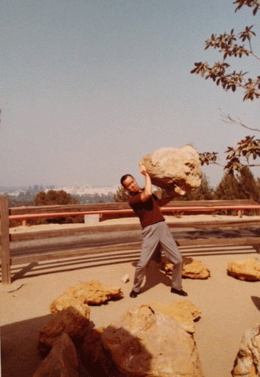 Dad_lifting_rocks