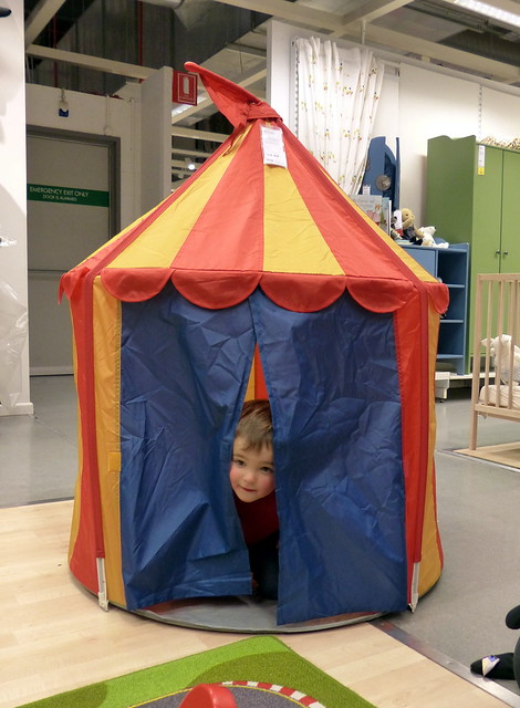 Eskil playing in a play tent