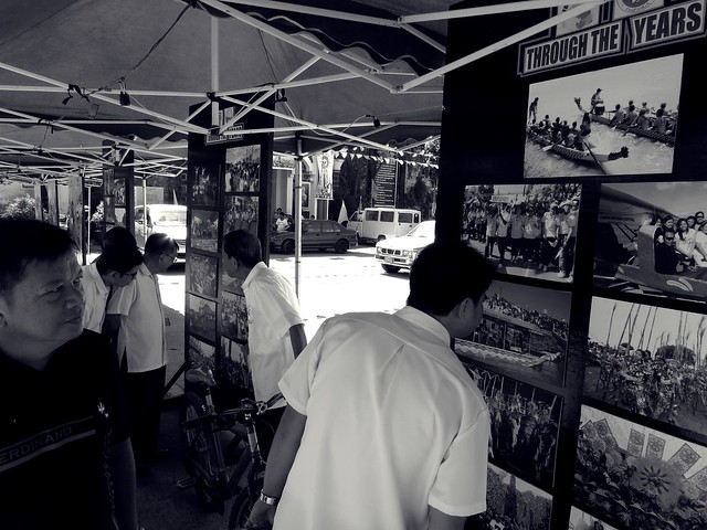 Municipal employees of Candaba looking at pictures of their town's milestones.  Photographed by Bernard Eirrol Tugade