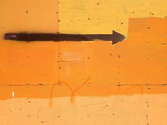 Orange painted boards and Arrow