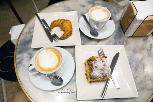 Cappuccino, croissant, orange and almond cake