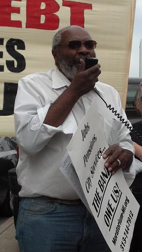 Abayomi Azikiwe, editor of the Pan-African News Wire, addressing retirees, workers and community activists in downtown Detroit outside the federal bankruptcy court on Friday Aug. 2, 2013. by Pan-African News Wire File Photos