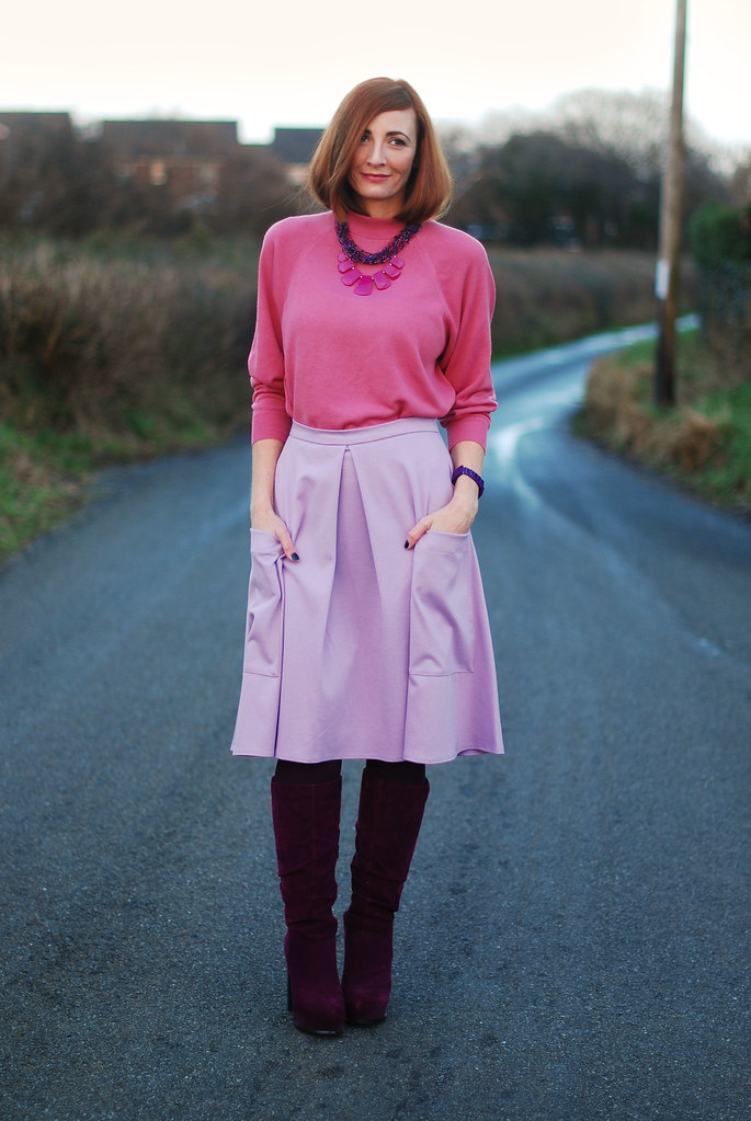 Pink sweater, lilac midi skirt & magenta boots