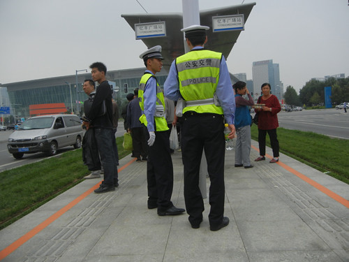 DSCN6285 _ Policemen at Tram Stop, Shenyang, China
