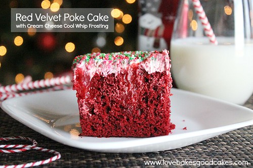 Red Velvet Poke Cake with Cream Cheese Cool Whip Frosting on white plate side view.