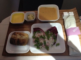 Soup and salad course on flight