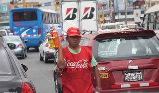 Coke street vendor on street in Lima