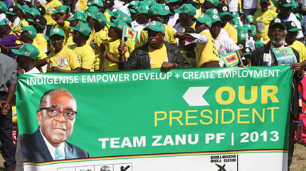 Banner for Team ZANU-PF, the ruling party in the Southern African state of Zimbabwe. President Mugabe is illustrated on the banner. by Pan-African News Wire File Photos