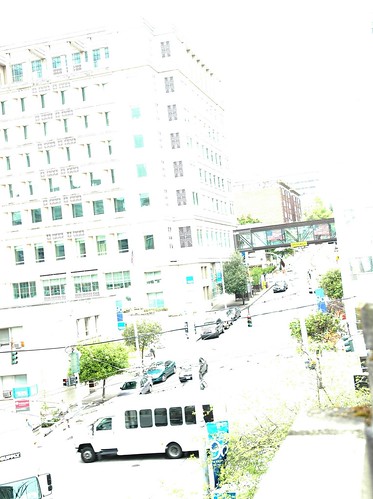 White overcast day, bus, overpass, street light on red, American flag, offices, Redmond, Washington, USA by Wonderlane