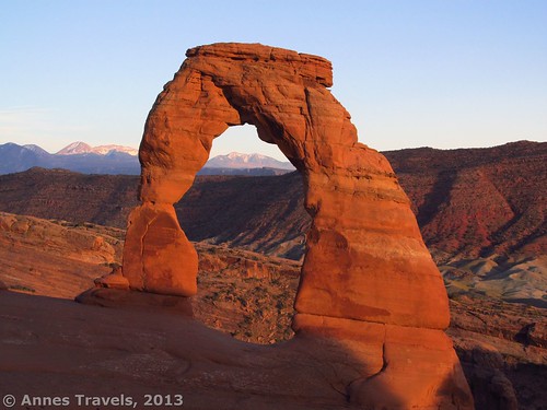 Near sunset, Delicate Arch comes into the shadow of nearby rocks, Arches National Park, Utah