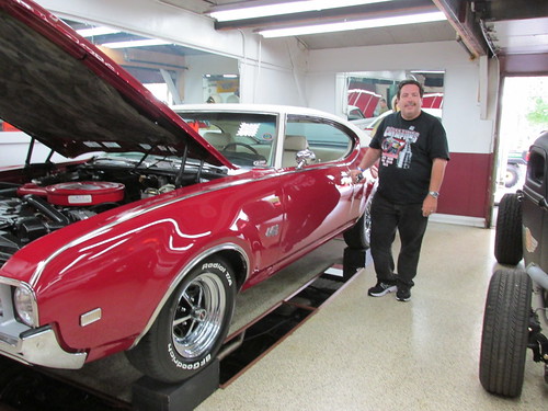 Eddie K posing by a classic American muscle car.  The Volo Antique Auto Museum.  Volo Illinois.  June 2013. by Eddie from Chicago
