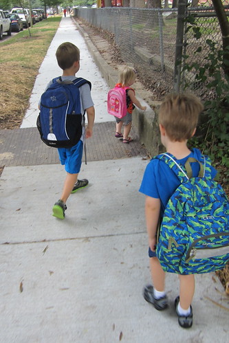 the boys, walking to THEIR school.