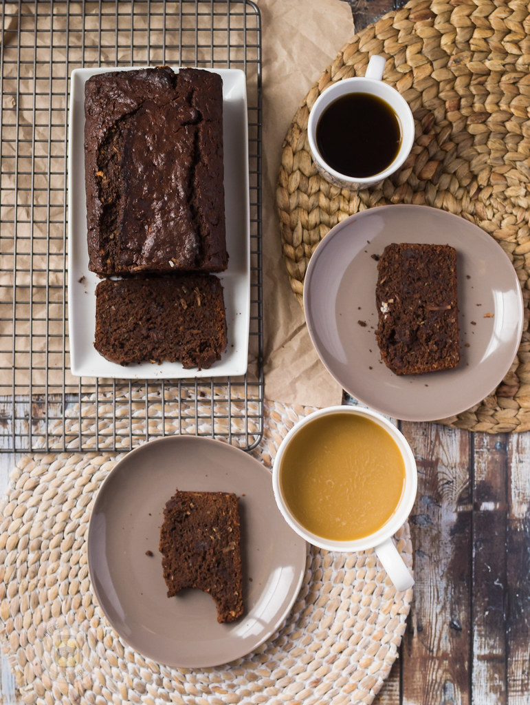 Chocolate Coconut Zucchini Bread plated with coffee cups