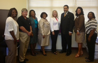 New SFSP Sponsor:  Alabama Department of Education’s Danielle Turk (middle) with Tuskegee University First Lady Patricia Rochon (Left) and her husband Dr. Gilbert Rochon, President of Tuskegee University (Right), pose with Macon County’s newest Summer Feeding Site representatives after becoming the County’s new Summer Sponsor in June 2013.