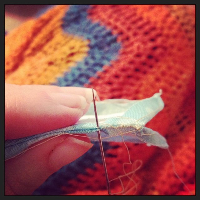 Paper piecing under a cozy crocheted blanket. #yearofmaking 6/375
