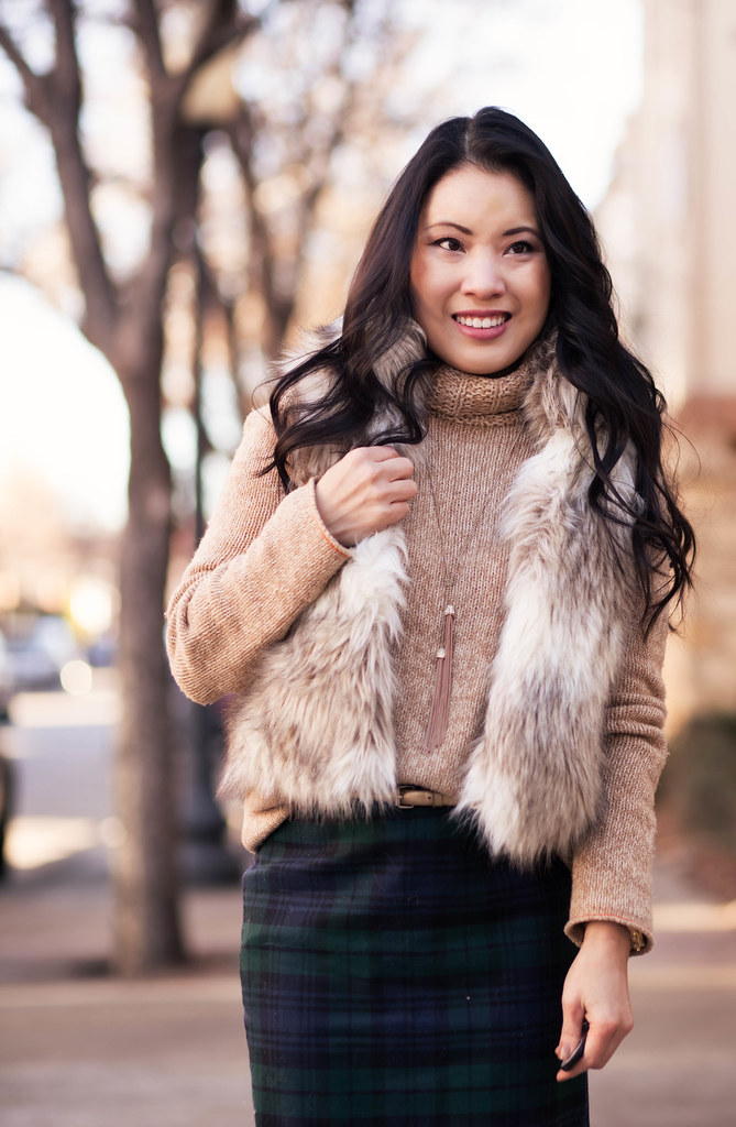 cute & little blog | fur vest, chunky turtleneck, plaid pencil skirt, brown tights, nude pumps, tassel necklace outfit