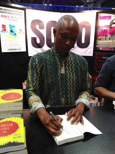 Okey Ndibe signing his book at BEA 2013