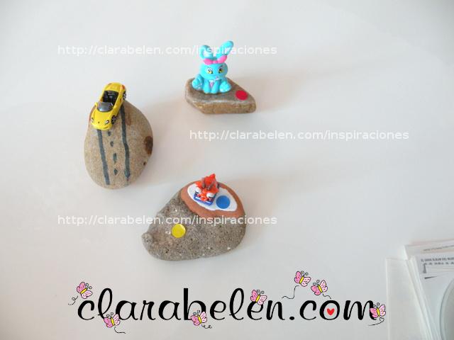 Pisapapeles para el dia del padre hecho con los niños con piedras y juguetes reciclados