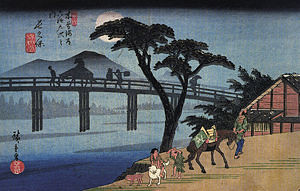 300px-Hiroshige_Man_on_horseback_crossing_a_bridge