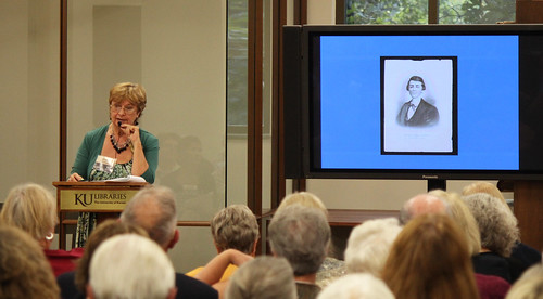 Curator of Collections Sheryl Williams speaks to the audience about Quantrill's Raid
