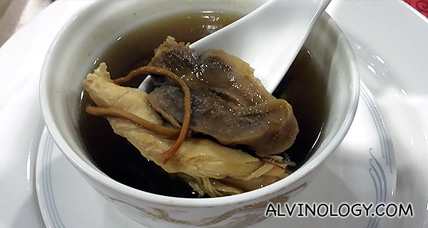Double-boiled chicken soup with “Maca” and dried conch in superior stock