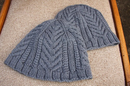 Two cabled hats